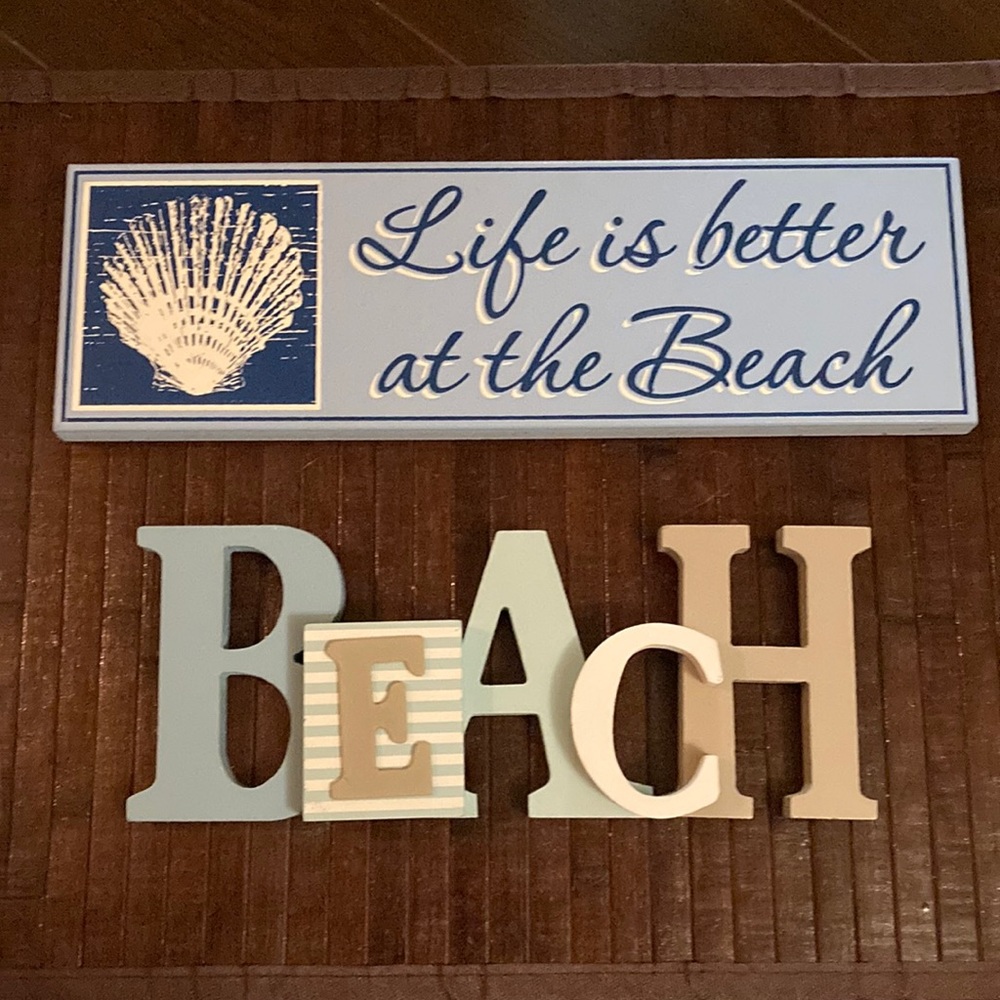 Two beach-themed pieces of wall art